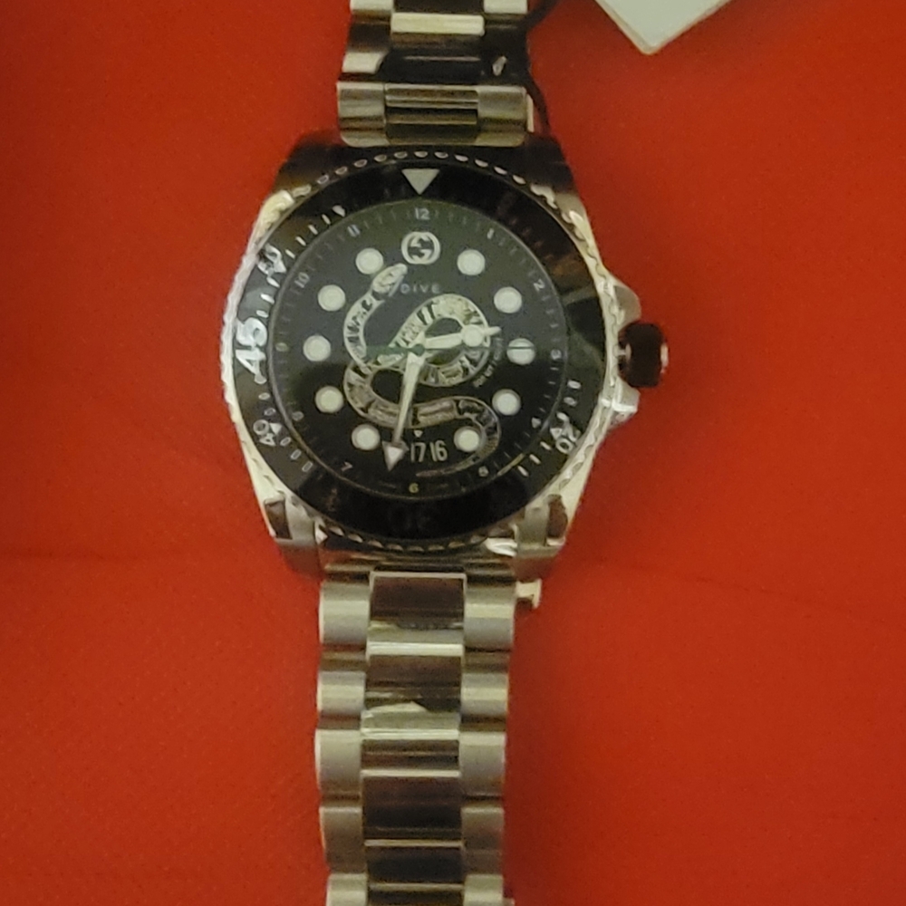 Authentic Gucci Men's Watch with Black Dial and Silver Band